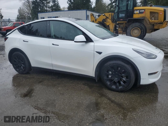 2021 Tesla Model Y Long Range with VIN 5YJYGAEE2MF115988, listed as a Copart auction lot 52206535 with 53,911 mi miles and Salvage Title. Bid and sale history available at DreamBid. Image 4.