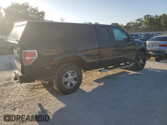 2009 Ford F-150 STX with VIN 1FTRX14W69FA23543, listed as a Copart auction lot 52314695 with 149,268 mi miles and Salvage Title. Bid and sale history available at DreamBid. Image 3.