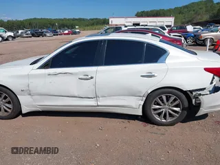 2014 Infiniti Q50 Premium with VIN JN1BV7AR0EM686530, listed as a IAAI auction lot 40381908 with 228,156 mi miles. Bid and sale history available at carsss.com. Image 14.