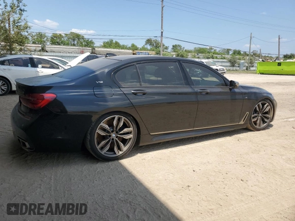 2019 BMW 7 Series M760i xDrive with VIN WBA7H6C50KG615270, listed as a Copart auction lot 59960854 with 42,172 mi miles and Salvage title. Bid and sale history available at DreamBid. Image 3.