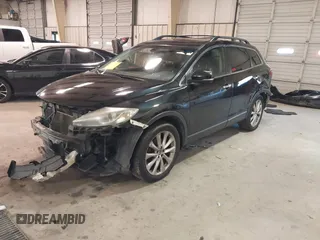 2015 Mazda CX-9 Grand Touring with VIN JM3TB3DV3F0460493, listed as a IAAI auction lot 41053565 with 213,124 mi miles. Bid and sale history available at carsss.com. Image 2.