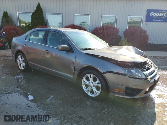 2012 Ford Fusion SE z VIN 3FAHP0HA0CR437115, wystawiony jako Copart lot #56583495 z przebiegiem 159 649 mil mil oraz Szkoda całkowita • Salvage title. Historia ofert i sprzedaży dostępna na DreamBid. Obrazek 4.