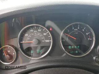 2014 Jeep Wrangler Unlimited Sahara with VIN 1C4BJWEG8EL266340, listed as a Copart auction lot 57809465 with 121,191 mi miles and Salvage title. Bid and sale history available at DreamBid. Image 9.