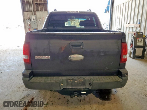 2007 Ford Explorer Sport Trac XLT z VIN 1FMEU31K57UA64013, wystawiony jako Copart lot #57179715 z przebiegiem 268 877 mil mil oraz Czysty tytuł • Clean title. Historia ofert i sprzedaży dostępna na DreamBid. Obrazek 6.
