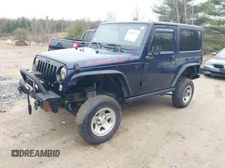 2013 Jeep Wrangler Rubicon 10th Anniversary with VIN 1C4BJWCG7DL544145, listed as a IAAI auction lot 41965259 with 125,900 mi miles and . Bid and sale history available at carsss.com. Image 18.