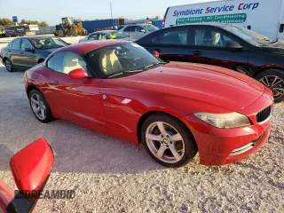 2010 BMW Z4 sDrive30i with VIN WBALM5C55AE377253, listed as a Copart auction lot 74230184 with 0 mi miles and Salvage Title. Bid and sale history available at carsss.com. Image 4.