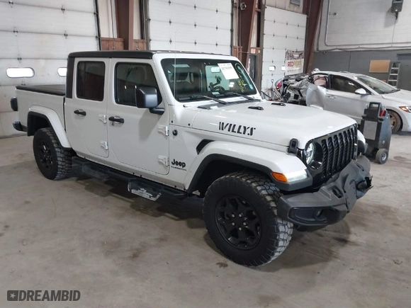 2021 Jeep Gladiator Texas Trail with VIN 1C6HJTAG3ML548261, listed as a IAAI auction lot 41791595 with 34,582 mi miles. Bid and sale history available at carsss.com. Image 1.