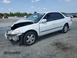 1999 Honda Accord LX with VIN 1HGCG564XXA074113, listed as a Copart auction lot 60091075 with Not provided miles and Salvage title. Bid and sale history available at DreamBid. Image 1.