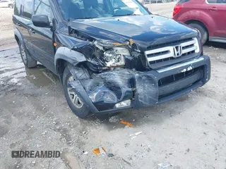 2006 Honda Pilot EX-L with VIN 2HKYF18506H530715, listed as a IAAI auction lot 42195804 with 252,295 mi miles and . Bid and sale history available at DreamBid. Image 6.