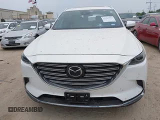 2023 Mazda CX-9 Grand Touring с VIN JM3TCBDY0P0634099, выставлен на аукционе IAAI как лот 41943704 с пробегом 5 615 миль миль и . История ставок и продаж доступна на DreamBid. Изображение 12.