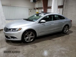 2014 Volkswagen CC VR6 Executive 4Motion with VIN WVWGU7AN5EE525409, listed as a Copart auction lot 83964324 with 118,465 mi miles and Salvage Title. Bid and sale history available at carsss.com. Image 1.