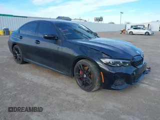 2022 BMW 3 Series M340i xDrive with VIN WBA5U9C08NFM68599, listed as a IAAI auction lot 41260340 with Not Provided miles and . Bid and sale history available at DreamBid. Image 1.