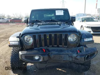2018 Jeep Wrangler Rubicon z VIN 1C4HJXCG9JW193703, wystawiony jako IAAI lot #42065185 z przebiegiem 61 518 mil mil oraz . Historia ofert i sprzedaży dostępna na DreamBid. Obrazek 12.