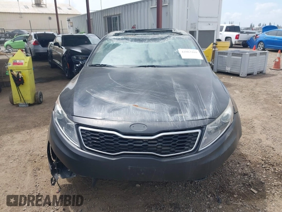 2012 Kia Optima Hybrid with VIN KNAGM4AD2C5014823, listed as a IAAI auction lot 42063169 with 125,235 mi miles. Bid and sale history available at carsss.com. Image 13.