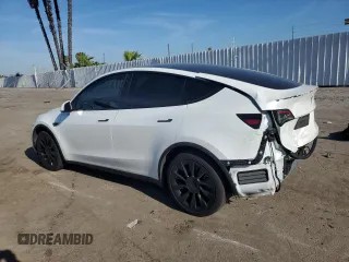 2022 Tesla Model Y Long Range with VIN 7SAYGDEE1NF339663, listed as a Copart auction lot 49771965 with 33,734 mi miles and Salvage Title. Bid and sale history available at carsss.com. Image 2.