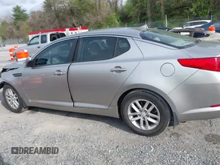 2012 Kia Optima LX with VIN KNAGM4A78C5283175, listed as a IAAI auction lot 42075886 with 123,112 mi miles and . Bid and sale history available at carsss.com. Image 14.