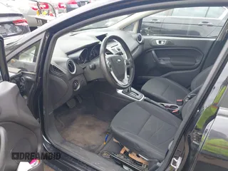 2014 Ford Fiesta SE z VIN 3FADP4EJ3EM205098, wystawiony jako IAAI lot #42371316 z przebiegiem 130 420 mil mil oraz . Historia ofert i sprzedaży dostępna na DreamBid. Obrazek 5.