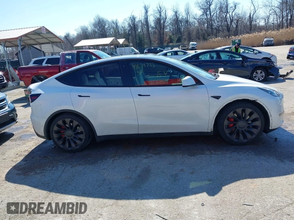 2021 Tesla Model Y Performance with VIN 5YJYGDEF8MF246658, listed as a IAAI auction lot 41679793 with 28,015 mi miles and . Bid and sale history available at DreamBid. Image 13.