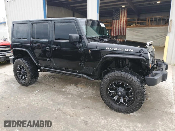 2014 Jeep Wrangler Unlimited Rubicon X with VIN 1C4HJWFG0EL142071, listed as a Copart auction lot 56187575 with 110,597 mi miles and Salvage title. Bid and sale history available at DreamBid. Image 4.