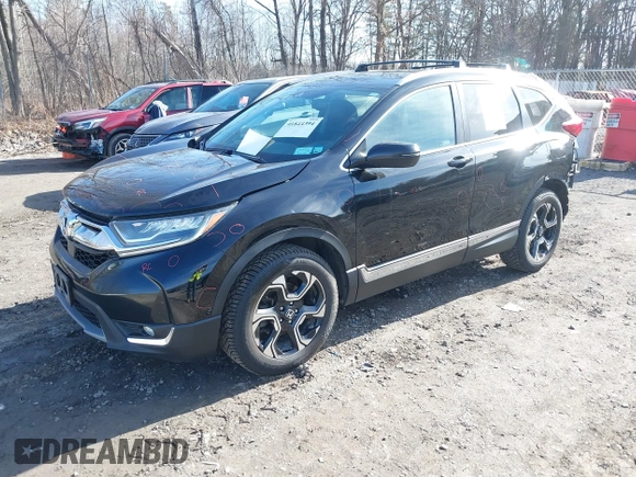 2019 Honda CR-V Touring with VIN 2HKRW2H95KH631787, listed as a IAAI auction lot 41844394 with 262,398 mi miles. Bid and sale history available at carsss.com. Image 17.