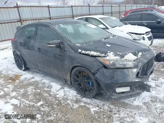 2015 Ford Focus ST with VIN 1FADP3L9XFL280578, listed as a IAAI auction lot 41248921 with 145,641 mi miles. Bid and sale history available at carsss.com. Image 1.