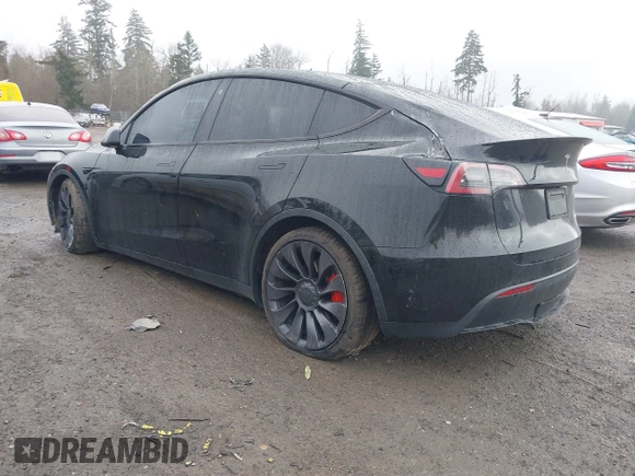 2021 Tesla Model Y Performance z VIN 5YJYGDEF2MF215938, wystawiony jako IAAI lot #41338287 z przebiegiem 63 925 mil mil oraz . Historia ofert i sprzedaży dostępna na DreamBid. Obrazek 3.