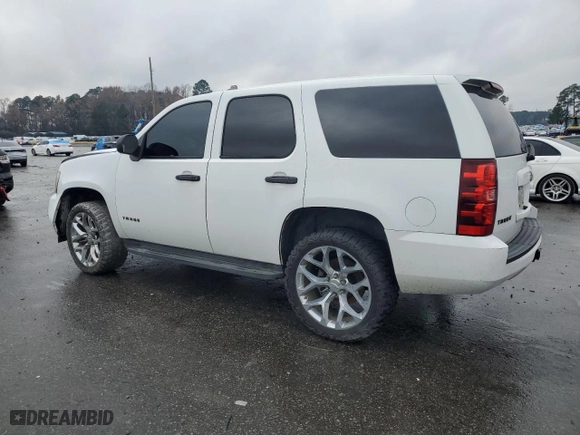 2010 Chevrolet Tahoe LS with VIN 1GNUKAE01AR287489, listed as a Copart auction lot 84373174 with 197,686 mi miles and Salvage Title. Bid and sale history available at carsss.com. Image 2.