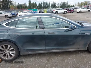 2013 Tesla Model S с VIN 5YJSA1CN1DFP27013, выставлен на аукционе IAAI как лот 42014212 с пробегом 65 858 миль миль и . История ставок и продаж доступна на DreamBid. Изображение 14.