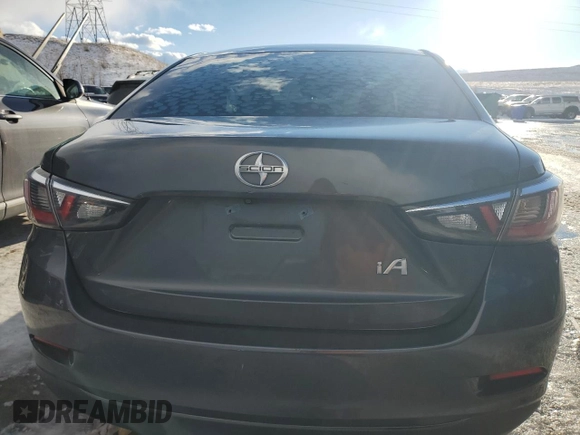 2016 Scion iA with VIN 3MYDLBZV1GY103531, listed as a Copart auction lot 42111955 with 104,882 mi miles and Salvage Title. Bid and sale history available at carsss.com. Image 6.