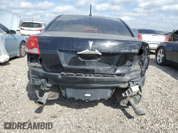 2009 Pontiac G8 z VIN 6G2ER57789L237107, wystawiony jako Copart lot #48974505 z przebiegiem 148 306 mil mil oraz Szkoda całkowita • Salvage title. Historia ofert i sprzedaży dostępna na DreamBid. Obrazek 6.