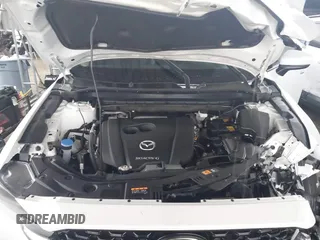 2023 Mazda CX-5 2.5 S Premium Package with VIN JM3KFBDM7P0165562, listed as a IAAI auction lot 41458088 with 35,168 mi miles. Bid and sale history available at carsss.com. Image 10.