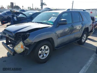 2003 Toyota 4Runner SR5 with VIN JTEZU14R238001341, listed as a IAAI auction lot 41670928 with 212,723 mi miles. Bid and sale history available at carsss.com. Image 2.