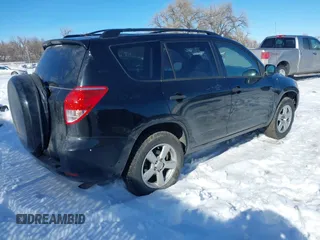2006 Toyota RAV4 with VIN JTMZD33V065016103, listed as a IAAI auction lot 41619545 with 198,590 mi miles. Bid and sale history available at carsss.com. Image 4.