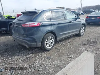 2019 Ford Edge SEL z VIN 2FMPK4J9XKBC58603, wystawiony jako IAAI lot #41814067 z przebiegiem 135 198 mil mil oraz . Historia ofert i sprzedaży dostępna na DreamBid. Obrazek 4.