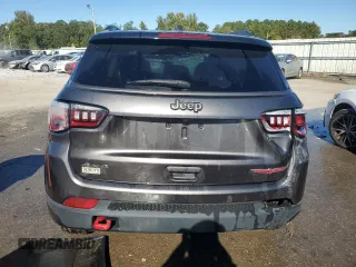 2021 Jeep Compass Trailhawk with VIN 3C4NJDDB3MT564983, listed as a Copart auction lot 76310514 with 77,585 mi miles and Non repairable. Bid and sale history available at DreamBid. Image 6.