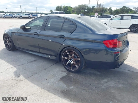 2013 BMW M5 with VIN WBSFV9C59DD096774, listed as a IAAI auction lot 41608286 with 82,601 mi miles. Bid and sale history available at carsss.com. Image 3.
