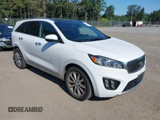 2016 Kia Sorento SX z VIN 5XYPKDA50GG007514, wystawiony jako IAAI lot #42371804 z przebiegiem 136 704 mil mil oraz . Historia ofert i sprzedaży dostępna na DreamBid. Obrazek 1.