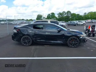 2017 Nissan Maxima SR с VIN 1N4AA6AP9HC391679, выставлен на аукционе IAAI как лот 41070687 с пробегом 141 355 миль миль и . История ставок и продаж доступна на DreamBid. Изображение 13.
