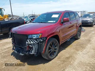 2019 Jeep Grand Cherokee Altitude with VIN 1C4RJFAG1KC619257, listed as a IAAI auction lot 42352249 with 72,562 mi miles and . Bid and sale history available at DreamBid. Image 2.