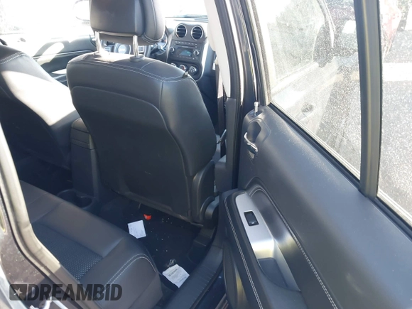 2014 Jeep Compass Latitude with VIN 1C4NJCEB3ED560058, listed as a IAAI auction lot 41470125 with 116,319 mi miles. Bid and sale history available at carsss.com. Image 8.