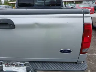 2002 Ford F-150 z VIN 2FTRX17L42CA98695, wystawiony jako IAAI lot #42154232 z przebiegiem 180 924 mil mil oraz . Historia ofert i sprzedaży dostępna na DreamBid. Obrazek 6.