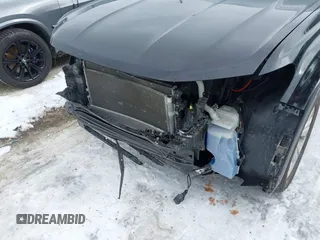 2023 Volkswagen Atlas SE z VIN 1V2KR2CA9PC502284, wystawiony jako IAAI lot #41614137 z przebiegiem 19 122 mil mil oraz . Historia ofert i sprzedaży dostępna na DreamBid. Obrazek 6.