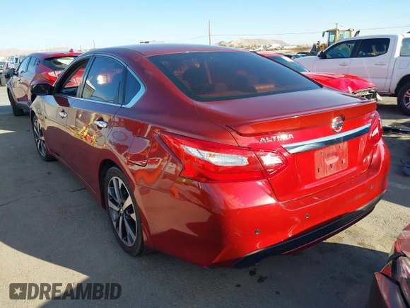 2016 Nissan Altima SR with VIN 1N4AL3AP5GC128614, listed as a IAAI auction lot 41625773 with 123,549 mi miles and . Bid and sale history available at DreamBid. Image 14.