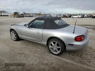 2001 Mazda MX-5 Miata with VIN JM1NB353510214097, listed as a Copart auction lot 50306595 with 111,359 mi miles and Salvage Title. Bid and sale history available at DreamBid. Image 2.