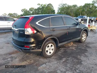 2015 Honda CR-V LX with VIN 5J6RM4H35FL038634, listed as a IAAI auction lot 41968956 with 149,407 mi miles and . Bid and sale history available at carsss.com. Image 4.