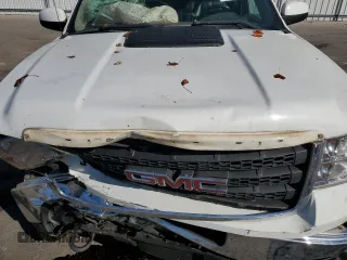 2011 GMC Sierra 2500HD SLT с VIN 1GT121C8XBF145553, выставлен на аукционе Copart как лот 77220804 с пробегом 414 257 миль миль и Списание • Salvage title. История ставок и продаж доступна на DreamBid. Изображение 12.