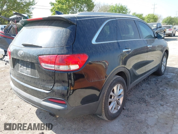 2017 Kia Sorento LX with VIN 5XYPG4A30HG242934, listed as a IAAI auction lot 41856236 with 164,664 mi miles. Bid and sale history available at carsss.com. Image 4.