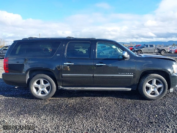 2013 Chevrolet Suburban LTZ with VIN 1GNSKKE7XDR211929, listed as a IAAI auction lot 41144666 with NaN miles. Bid and sale history available at carsss.com. Image 13.