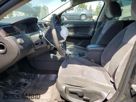 2014 Chevrolet Impala LS with VIN 2G1WA5E37E1105968, listed as a Copart auction lot 61287875 with 73,497 mi miles and Salvage title. Bid and sale history available at DreamBid. Image 7.