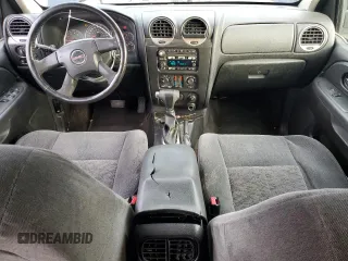 2006 GMC Envoy SLT with VIN 1GKDS13S762343520, listed as a Copart auction lot 82714134 with 0 mi miles and Clean Title. Bid and sale history available at carsss.com. Image 8.
